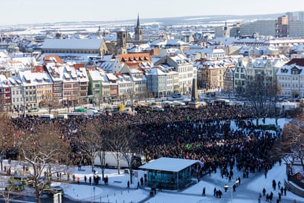 Crowds gather in Erfurt, eastern Germany, on Saturday after news of AfD’s meetings with neo-Nazis emerged.