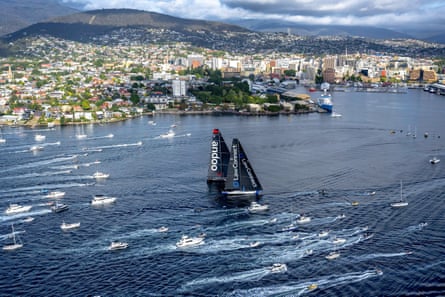 Aerial view of LawConnect and Andoo Comanche near the finish line in Hobart surrounded by spectator boats