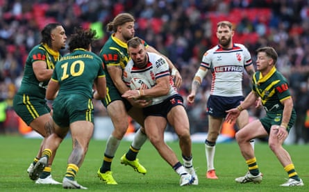 England’s Mike McMeeken is tackled by Australia’s Patrick Carrigan at Wembley