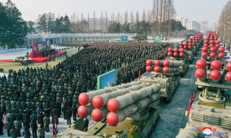 New super-large multiple rocker launchers are presented before a plenary meeting of the ruling Workers' Party of Korea at an undisclosed location, in a photo released on Sunday by North Korean state media