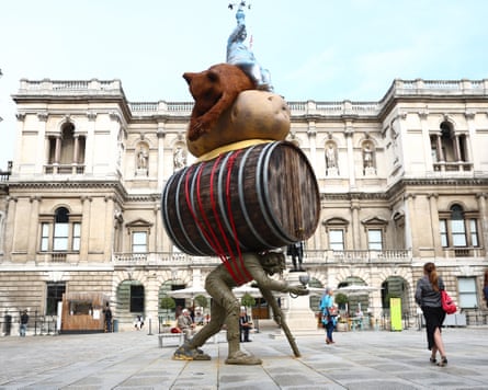 Nicole Eisenman’s sculpture “Stack” stands on tall legs outside the Royal Academy of Arts