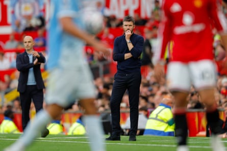 Michael Carrick looks on from the touchline during the Manchester derby.