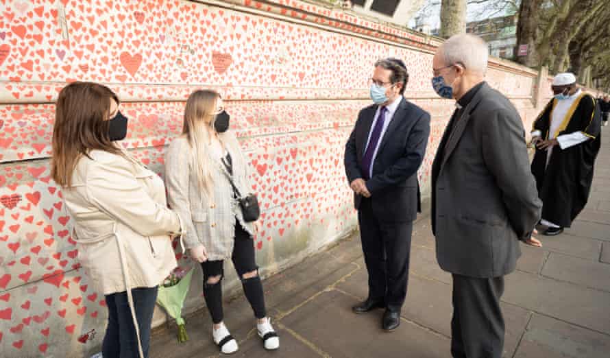 Rabbi Daniel Epstein and archbishop of Canterbury Justin Welby with surviving relatives Michelle and Courtney Rumball.