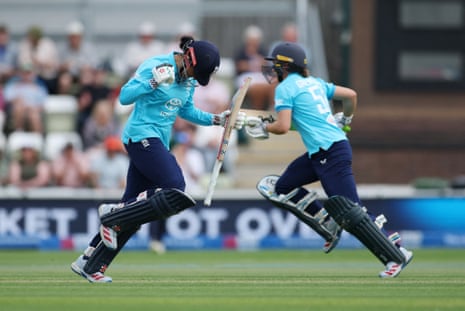 England's Sophia Dunkley celebrates reaching her century.