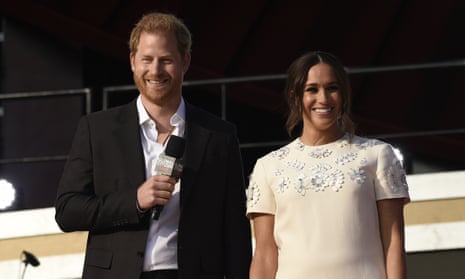 Prince Harry, the Duke of Sussex, left, and Meghan Markle, the Duchess of Sussex, speak at Global Citizen Live in Central Park, New York.
