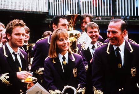 Fitzgerald with Ewan McGregor (left) and Pete Postlethwaite in the 1996 film Brassed Off.