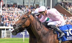 James Doyle, right, and Warm Heart edge out Frankie Dettori and Free Wind in the Yorkshire Oaks