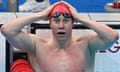 Britain's Tom Dean reacts in disbelief after winning gold in the men's 200m freestyle at the Tokyo Games