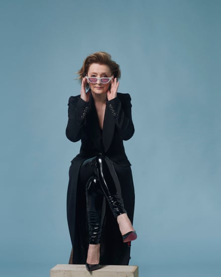 Jacket, by Temperley. Leggings, by Wolford. Heels, by Christian Louboutin. Sunglasses by G.O.D. Eyewear. Top image: beaded dress and rose corsage, both by Richard Quinn.