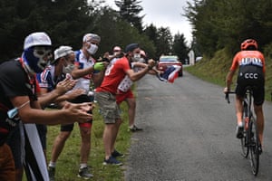 Spectators applaud Team CCC rider Russia’s Ilnur Zakarin.