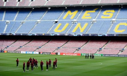 Liverpool players on the Camp Nou pitch in the run-up to their Champions League semi-final first leg.