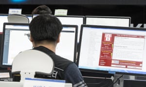 Employees at South Korea’s internet and security agency watch for possible malware attacks. 