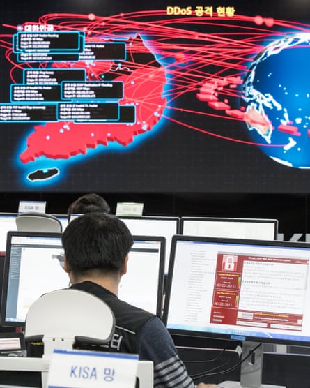 Employees monitor possible ransomware cyber-attacks at the Korea Internet and Security Agency (Kisa) in Seoul, South Korea, on 15 May.