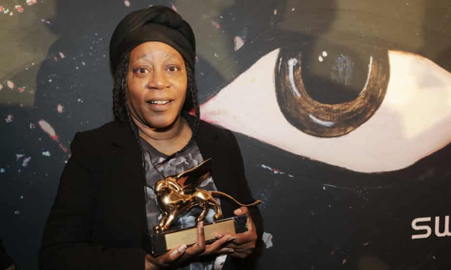 Sonia Boyce poses with her award in Venice.