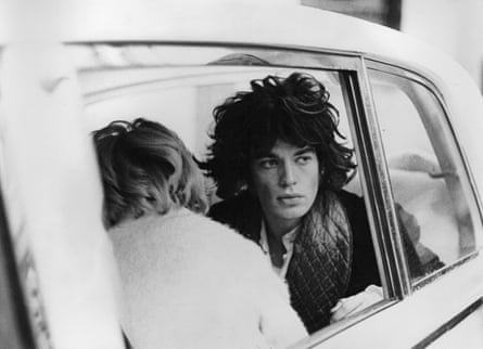 Mick Jagger shooting the final scenes in a white Rolls-Royce borrowed from John Lennon.