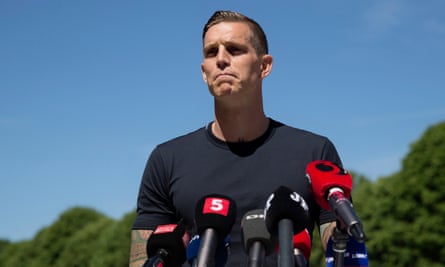Daniel Agger speaking at a press conference