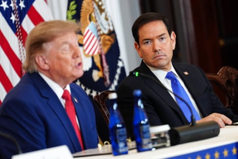 Trump and Marco Rubio speaking at a panel