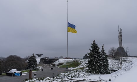 The Ukrainian flag flatters at half mast near the Ukrainian Motherland monument in Kyiv, Ukraine, Tuesday, Nov. 29, 2022.