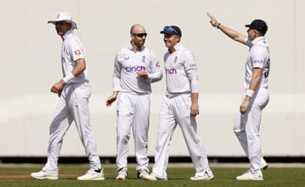 Jack Leach (second left) is congratulated by his teammates after taking a wicket in the warm-up match.