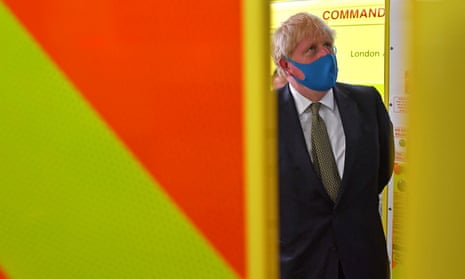 Boris Johnson, wearing a face mask, at the headquarters of the London Ambulance Service, 13 July 2020