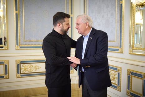 Volodymyr Zelenskyy (L) and Lindsey Graham (R) shaking hands during their meeting in Kyiv on 30 May 2025.