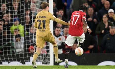 Brazilian midfielder Fred shoots and scores.