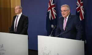 The head of the National Covid-19 Coordination Commission, Nev Power (left), and the prime minister, Scott Morrison