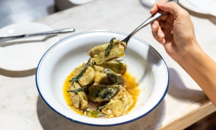 Handmade spinach agnolotti filled with mortadella & ricotta with lemon zest butter sauce