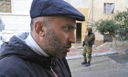 Palestinian human rights activist Issa Amro at his home in Hebron.  Issa's house was closed by the army for a week.