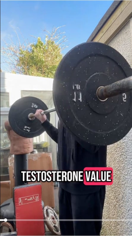 A screen grab of a TikTok video of a person lifting a barbell talking about testosterone