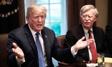 Donald Trump and John bolton meet senior military leaders at the White House in 2018.