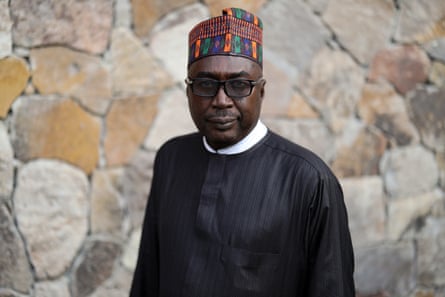 An older black African man in a Habar Kada, a Hausa cap 