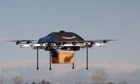 Amazon shows off an ‘octocopter’ mini-drone that would be used to fly small packages to consumers on a test flight in 2013.