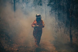 Firefighters battle bushfires in Tarome and Lower Beechmont, Queensland.