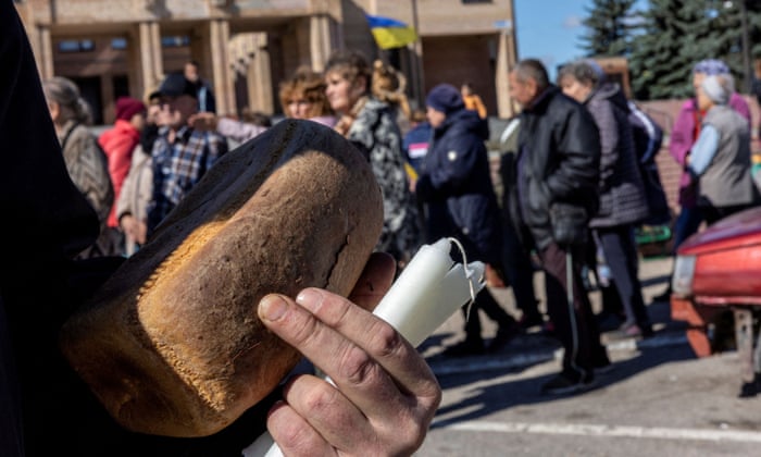 Bread, candles and food were provided by aid workers as there is no electricity in Balakliia, recently liberated by Ukrainian Armed Forces.