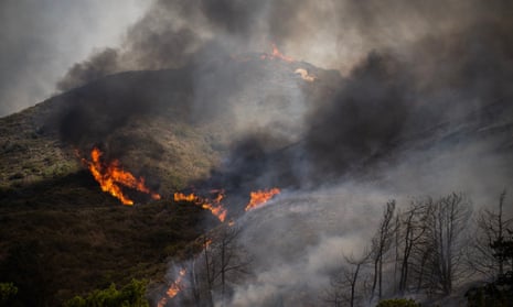 Wildfires burn near the coastal town of Gennadi in Rhodes