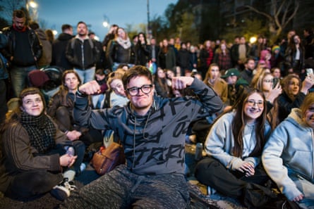 People attend to the anti-government concert called "Rendszerbontó Nagykoncert" at Heroes' Square in Budapest, 10 April.