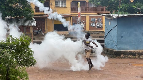 Police fire at demonstrators protesting over cost of living spikes in Sierra Leone – video