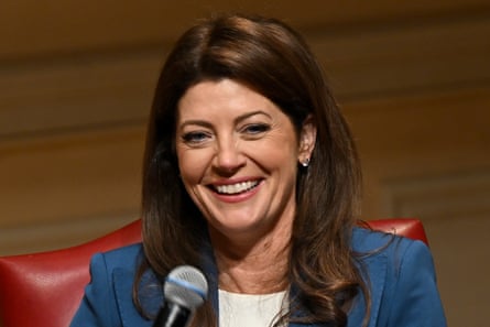 a woman holding a microphone