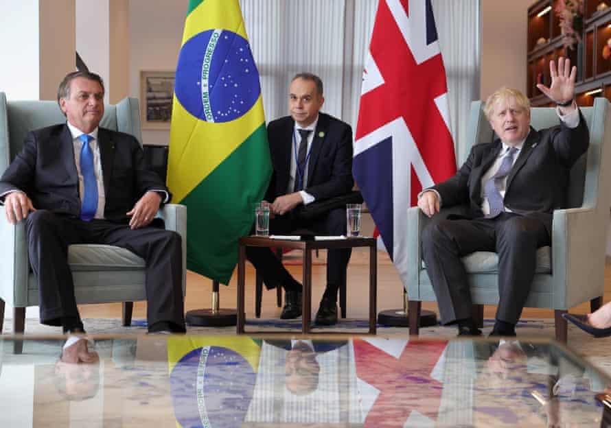 The British prime minister, Boris Johnson, right, in a bilateral meeting with the president of Brazil, Jair Bolsonaro, at the UN general assembly in New York on 20 September 2021