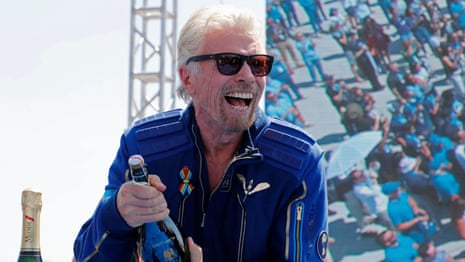 Richard Branson completes flight to edge of space – video