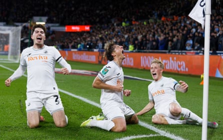 Swansea’s Gonçalo Franco of Swansea City (centre) shares his joyousness aft scoring pinch Joshua Key (left) and Melker Widell (right)