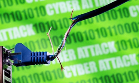 A broken Ethernet cable, binary code and words 'cyber attack'