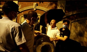 A protester shouts pro-China slogans outside the US Consulate General in Chengdu