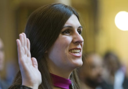 Danica Roem, he first transgender delegate, takes her oath of office during opening ceremonies of the 2018 session of the Virginia House of Delegates at the Capitol in Richmond, Va.