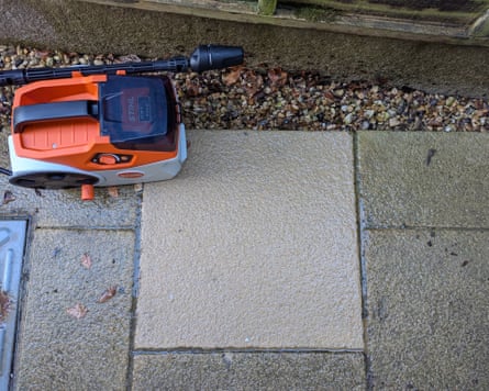 A patio slab after the Stihl Rea 60 Plus pressure washer cleaned it