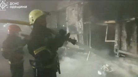 Firefighters tackle a blaze after a Russian drone strike.