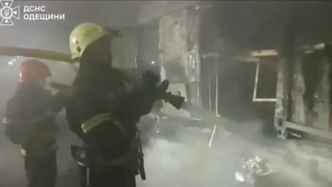 Firefighters tackle a blaze after a Russian drone strike dqxikeidqkikdinv