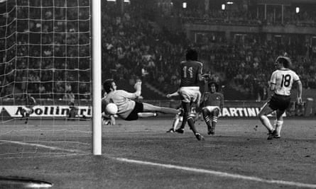 Sergio Ahumada, right, scores for Chile 1-1 draw with East Germany at the 1974 World Cup. Véliz, No11, watches on as the ball goes past the diving Juergen Croy