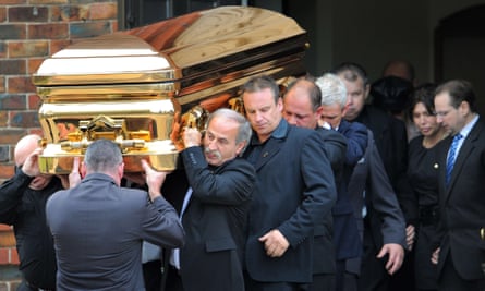 Carl Williams’ widow Roberta follows his coffin at his funeral in Melbourne in 2010